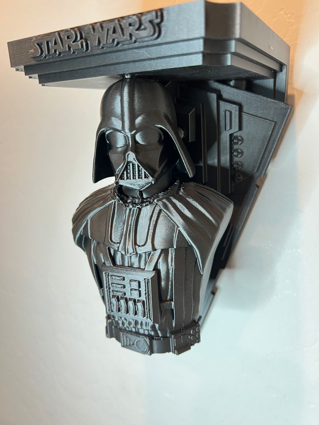 Darth Vader floating wall shelf in metallic gray
